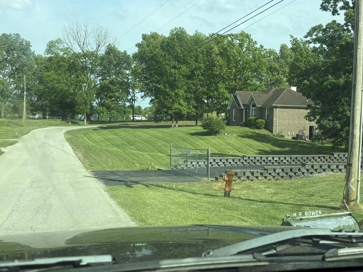 Large gated property seen through the truck windshield